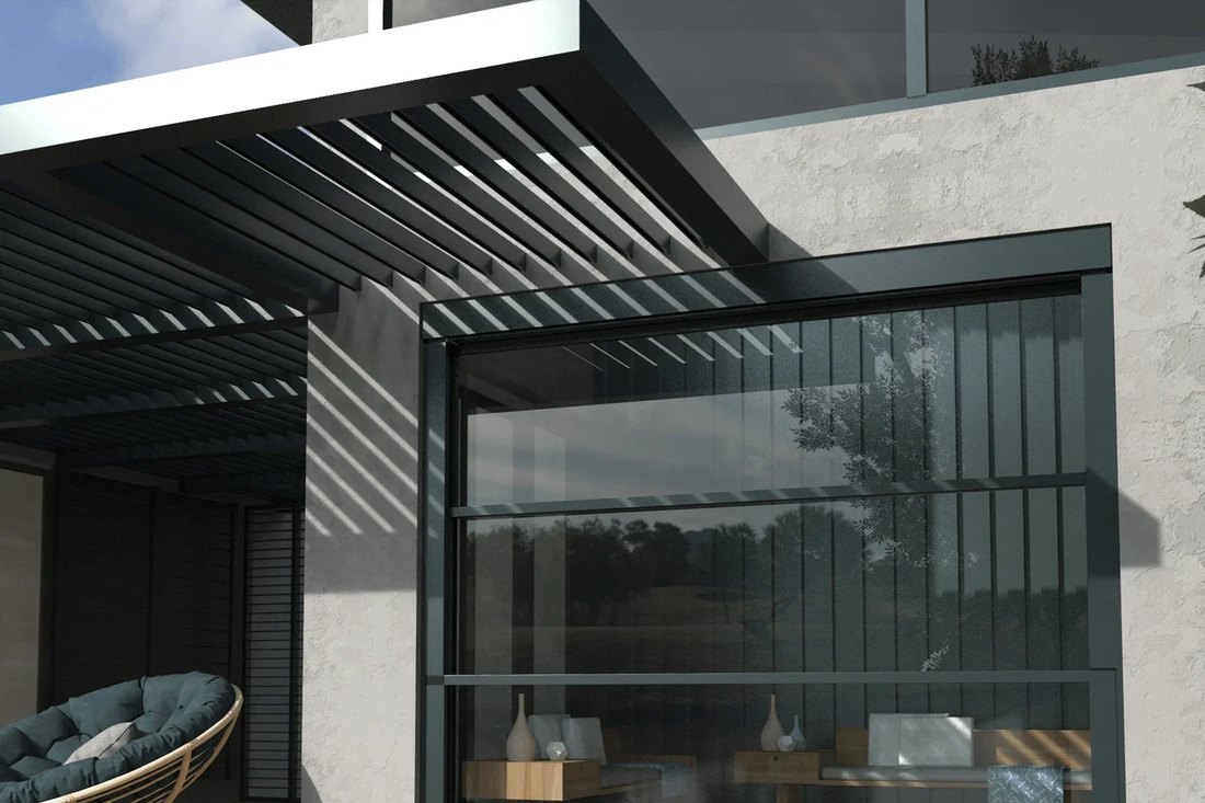 Aluminum louvered pergola system with glass side enclosure